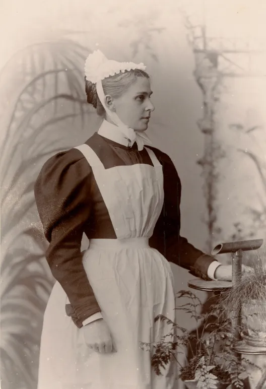 A Victorian housemaid in uniform